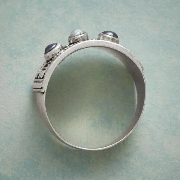 Geometric Ring with Carved Pearl and Three Stones
