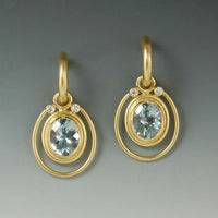 Vintage gold earrings with light blue crystal