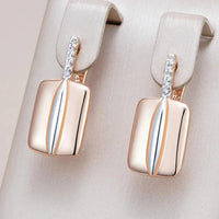 Rectangular gold earrings with rhinestones