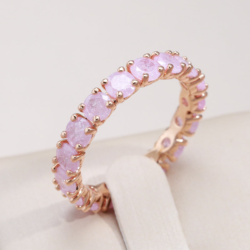 Luxurious gold ring with colored zirconia stones