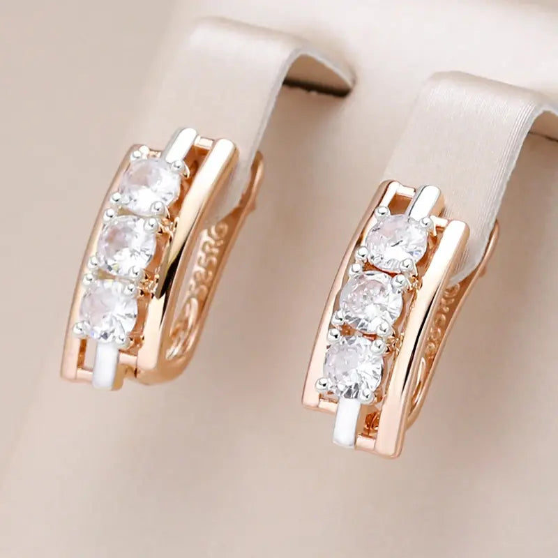 Earrings with crystals set in gold