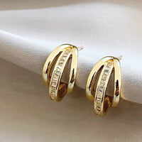Triple Tire Earrings in Gold