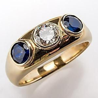Ring with zirconia and blue crystal