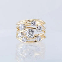 Golden multi-layer ring with vintage crystals