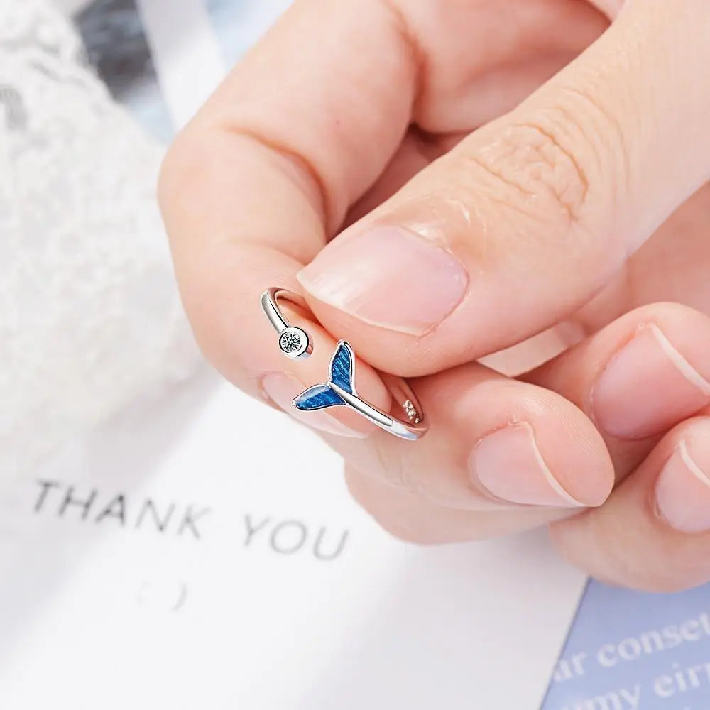 Silver ring with whale tail and zirconia